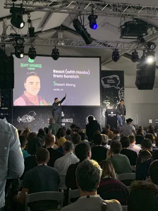 swyx on stage at React Advanced